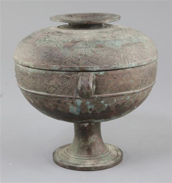 A Chinese archaic bronze ritual vessel and cover, Dou, Warring States period, 5th-4th century B.C., 20.5cm high, 24cm wide